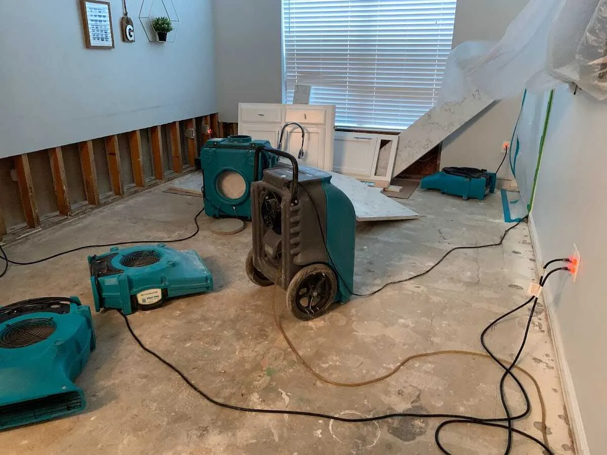 Dehumidifier in flood-cut room for Water Damage Restoration in Spanish Lake